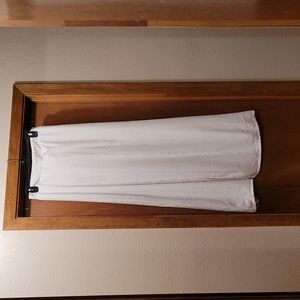 Women's size M skirt, off white color, slit in front on right side